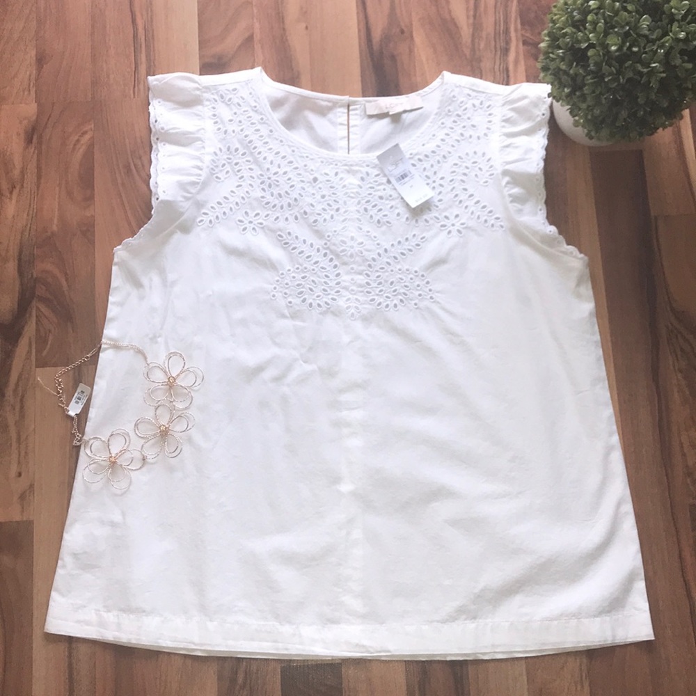 Eyelet flutter sleeve top